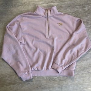 Nike’s W’s Retro 1/4 zip Pullover